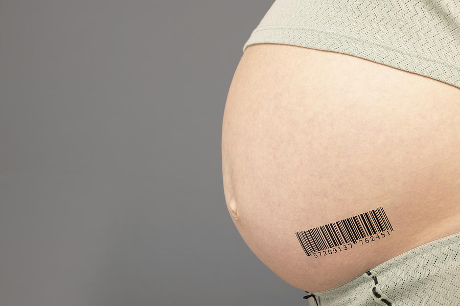 Mid Section View of a Pregnant Woman With a Barcode on Her Stomach Photograph by Nick White