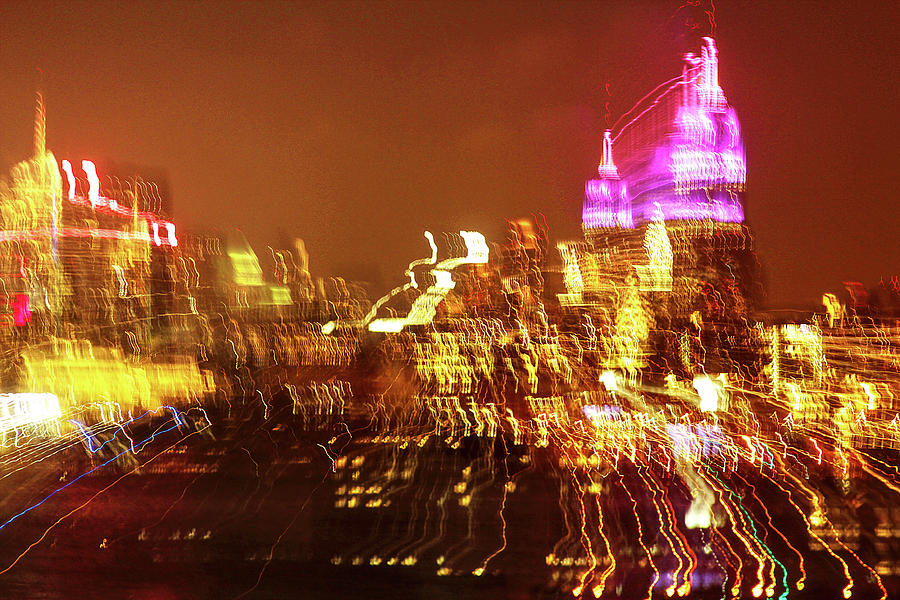 Midtown Manhattan with empire state with pink light Photograph by Habib Ayat