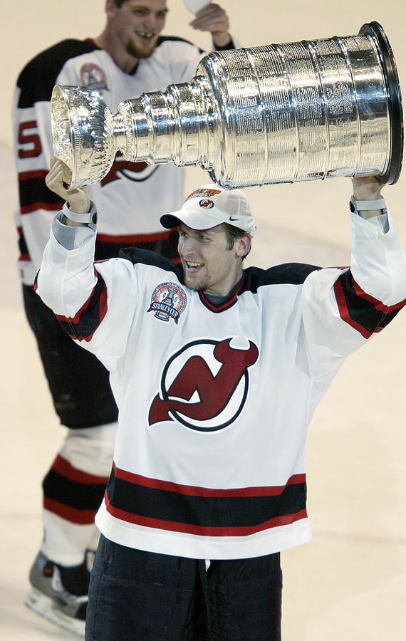 Mike Rupp hoists the Stanley Cup Photograph by Al Bello
