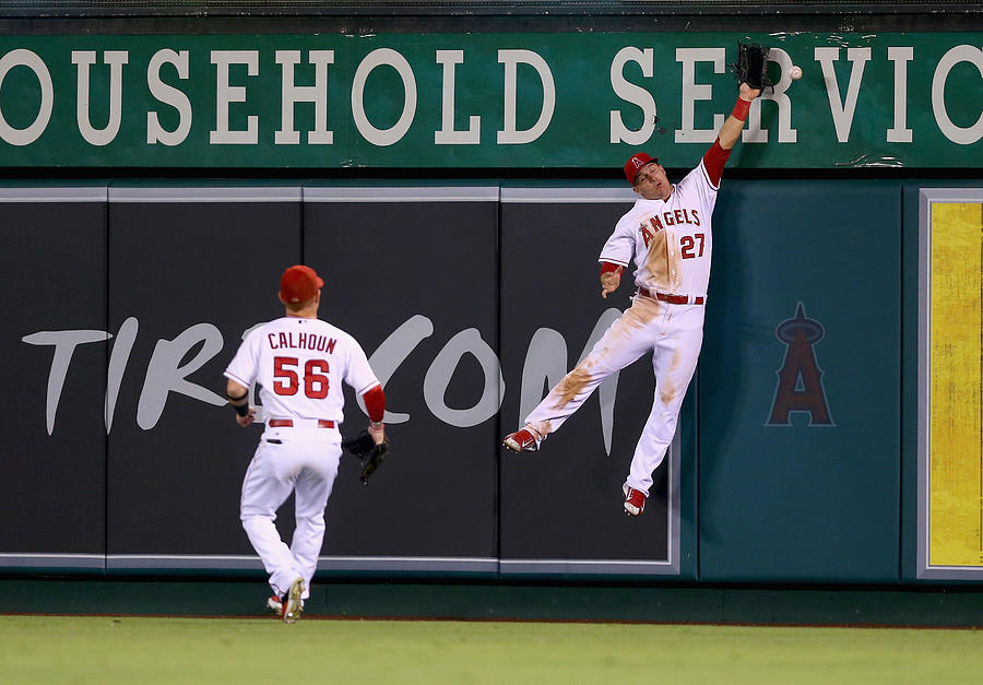 Mike Trout and Kole Calhoun Photograph by Jeff Gross