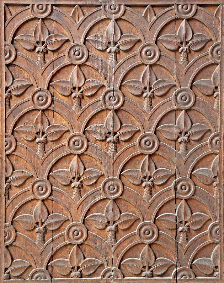 Milan - detail from carved church gate Photograph by Sedmak