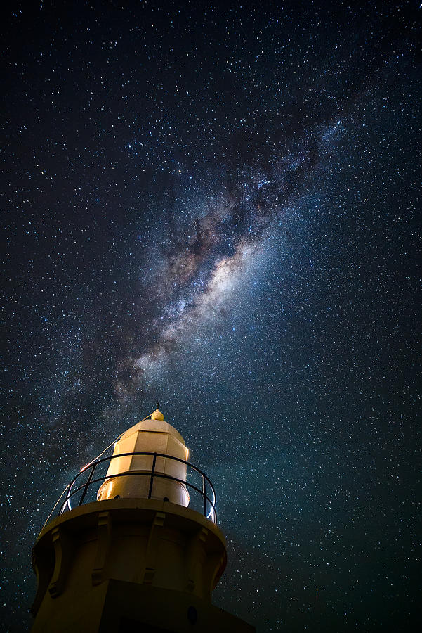 Milky Way and the lighthouse Photograph by Photography by Byron Tanaphol Prukston