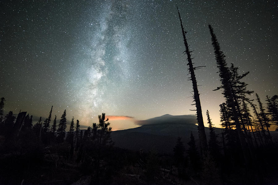 Milky way over a shrouded Mt. Hood and night sky with stars Photograph by Tyler Hulett