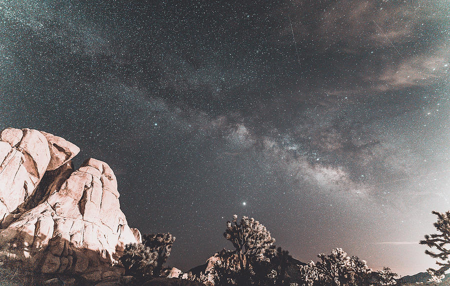 Milky way over the hidden Valley at Joshua Tree National Park Photograph by Hyuntae Kim