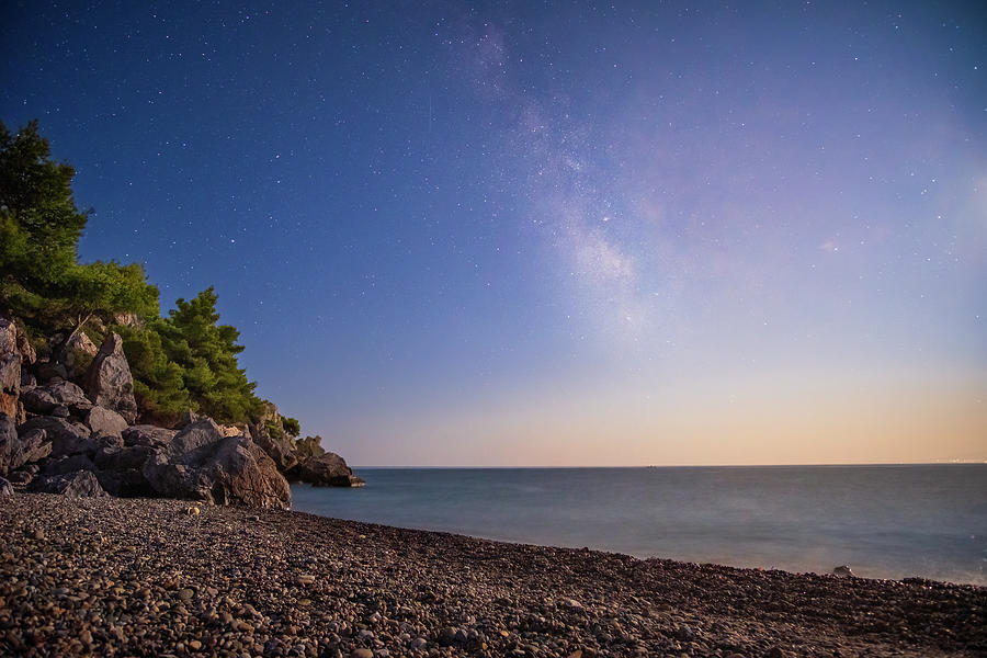 Milky Way Rising Over A Rocky Seashore Photograph by Alexios Ntounas