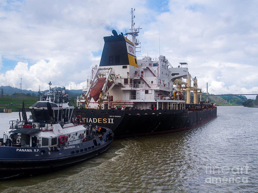 Miltiades II and a Tugboat on the Panama Canal Photograph by L Bosco
