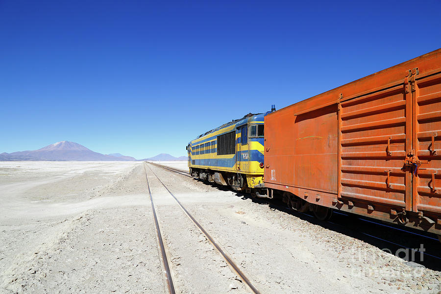 Freight Train Crossing the Salar de Chiguana Bolivia Photograph by James Brunker