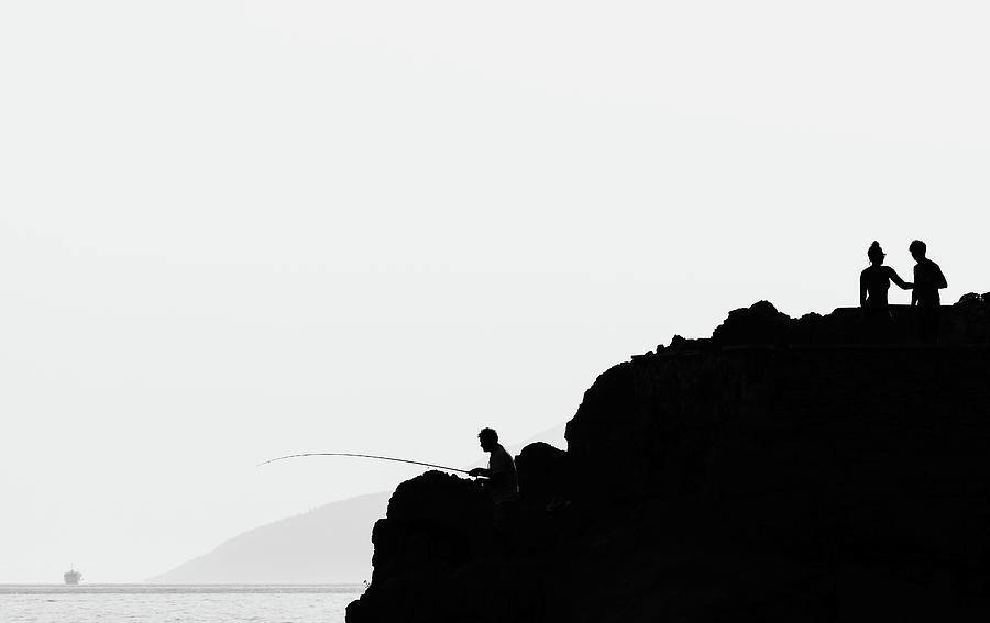Minimalist photography of silhouettes on the rock above the sea Photograph by Martin Vorel Minimalist Photography