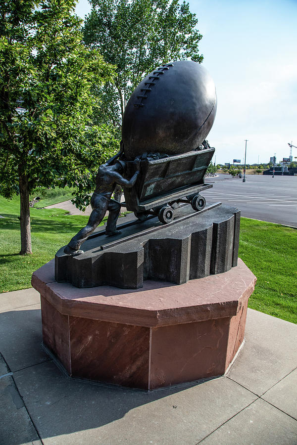 Mining and football statue outside Empower Field at Mile High Stadium in Denver Colorado Photograph by Eldon McGraw