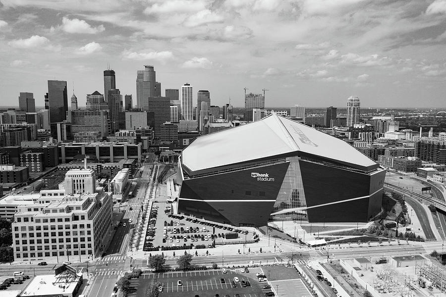 Minnesota Vikings US Bank Stadium with Minneapolis skyline in black and white Photograph by Eldon McGraw