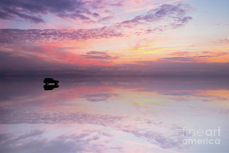Sunset Photograph - Mirror effect at sunset in Salar de Uyuni, Bolivia by Delphimages Photo Creations