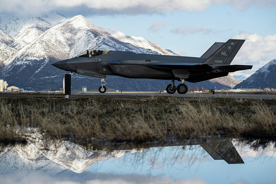 Mirror image F35a Lightning II Photograph by Lawrence Christopher