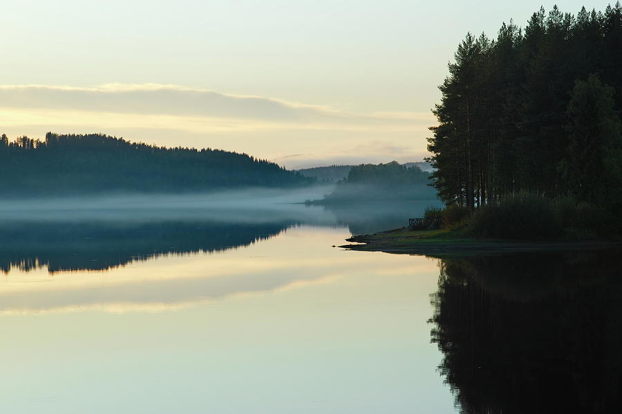 Mist is rising over a quiet forest lake at dusk Photograph by Ulrich Kunst And Bettina Scheidulin