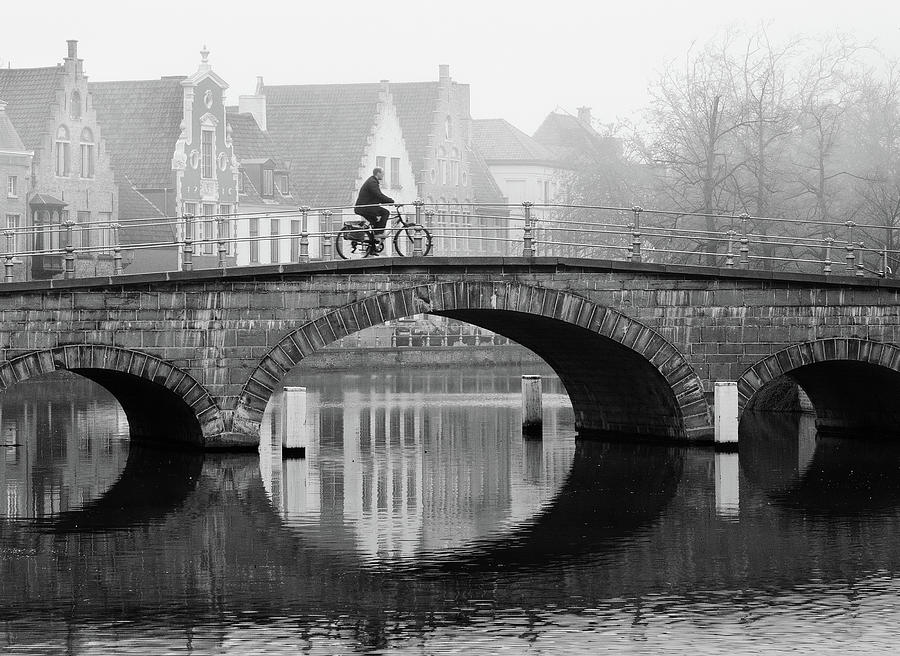 Black And White Photograph - Misty Morning in Bruges  by Barry O Carroll