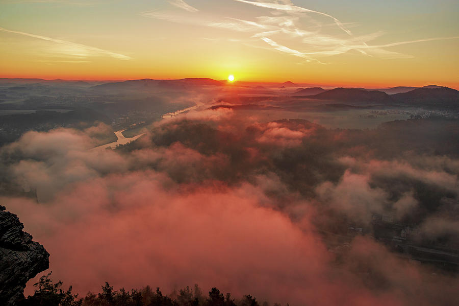 Misty sunrise on Lilienstein mountain Photograph by Sun Travels