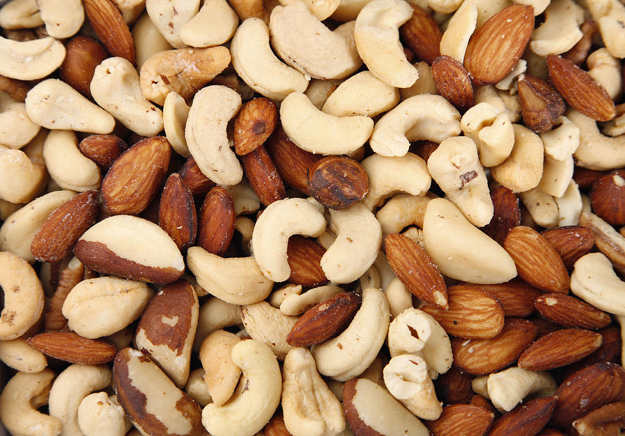 Mixed Salted Nuts Photograph by Duckycards