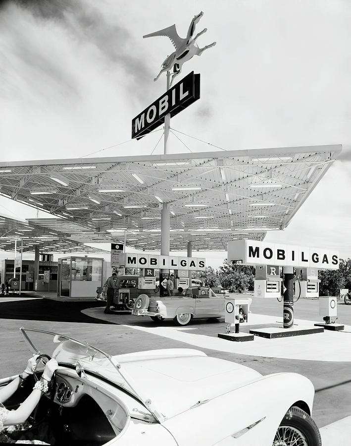Mobil gas station with 1954 Austin Healey Photograph by Retrographs