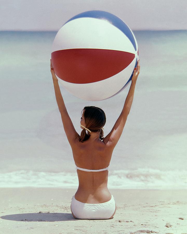 Model Holding Beach Ball Overhead Photograph by Lionel Kazan Model Holding Beach Ball Overhead Photograph by Lionel Kazan