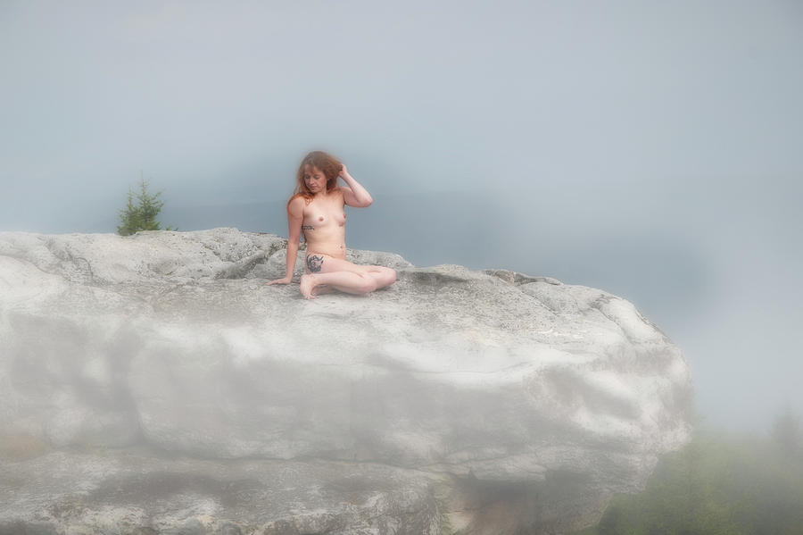 Model on rocks outdoors in the fog posing nude and topless 20 Photograph by Daniel Friend