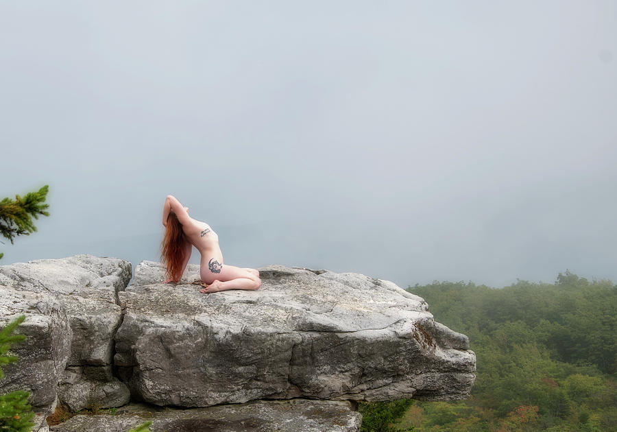 Model on rocks outdoors in the fog posing nude and topless 21 Photograph by Daniel Friend