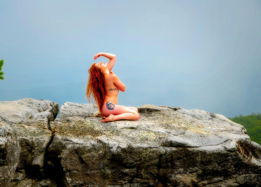 Model on rocks outdoors in the fog posing nude and topless 24 Photograph by Daniel Friend