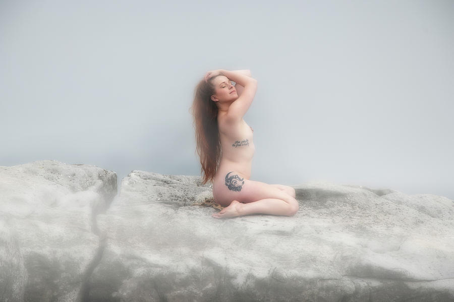 Model on rocks outdoors in the fog posing nude and topless 26 Photograph by Daniel Friend