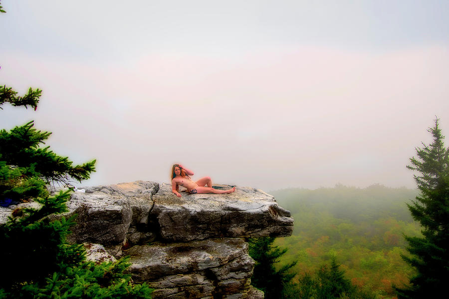 Model on rocks outdoors in the fog posing nude and topless 36 Photograph by Daniel Friend