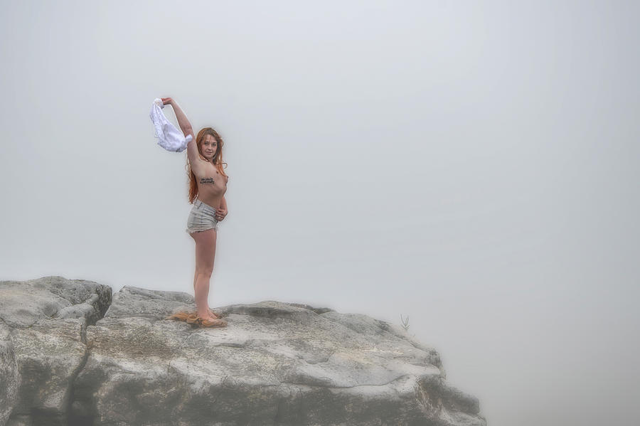 Model on rocks outdoors in the fog posing nude and topless 47 Photograph by Daniel Friend
