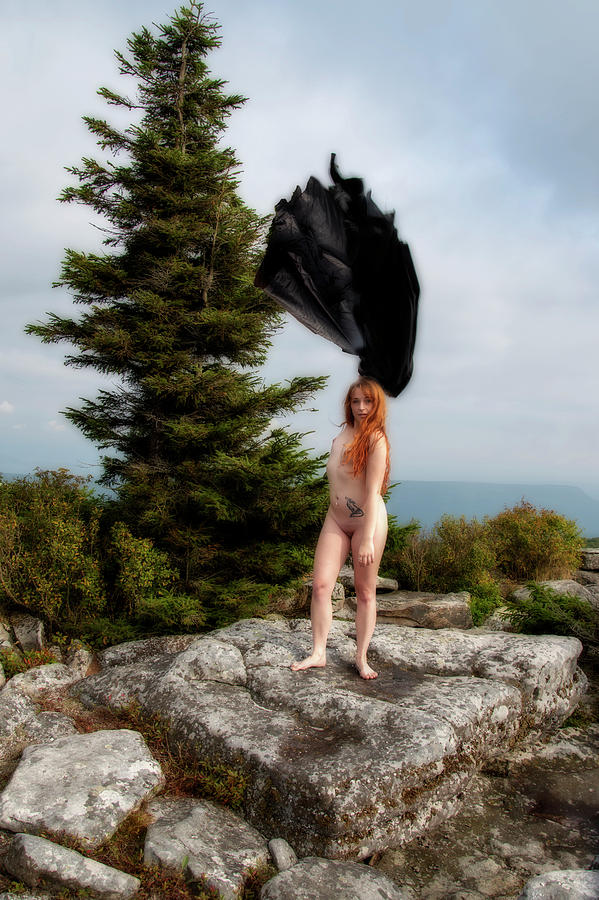 Model on rocks outdoors in the fog posing nude and topless 5 Photograph by Daniel Friend