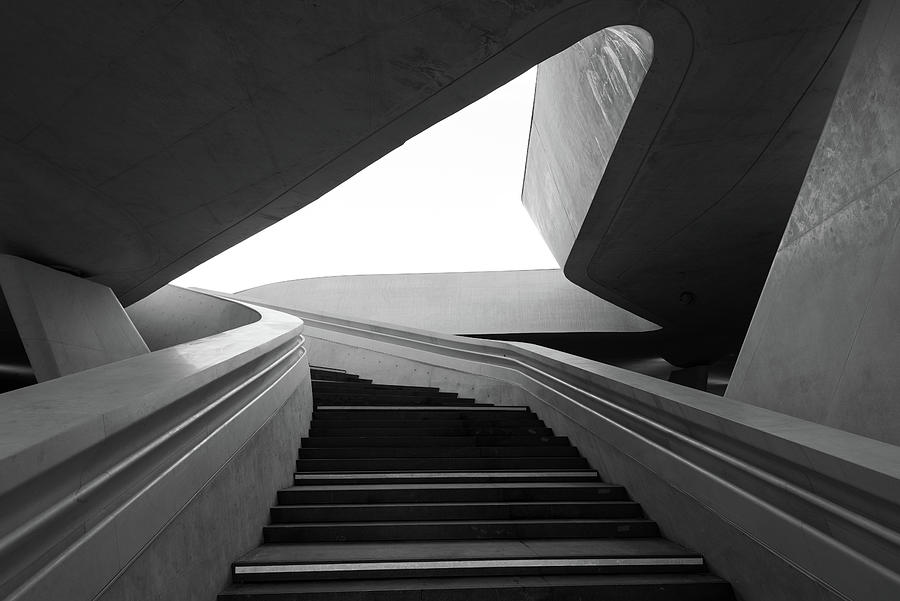 Modern architecture and empty staircase leading to a bright open space. Photograph by Michalakis Ppalis