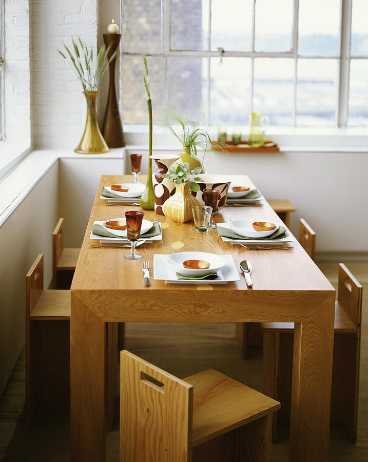 Modern dining room table Photograph by Lisa Hubbard