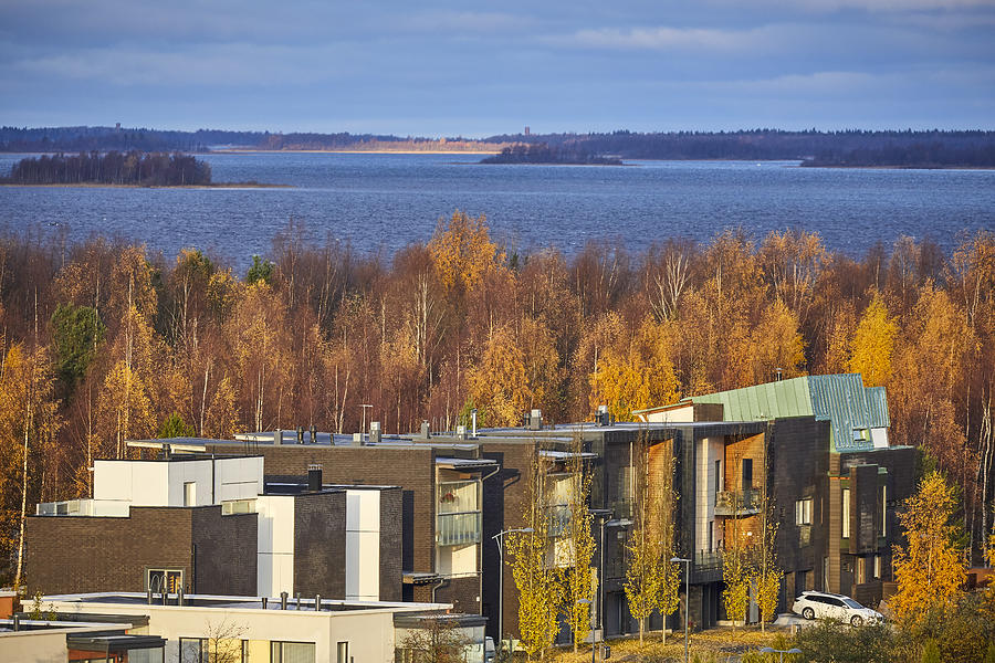 Modern Finnish houses and apartments in autumn, Oulu, Finland Photograph by Andrew Merry