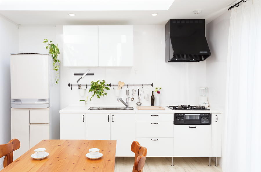 Modern kitchen white room interior. Photograph by Mykeyruna