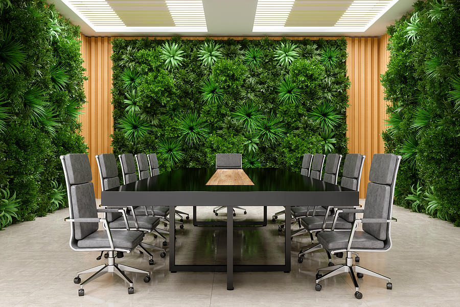 Modern Meeting Room Interior With Conference Table, Office Chairs And Plant Wall Background Photograph by Onurdongel