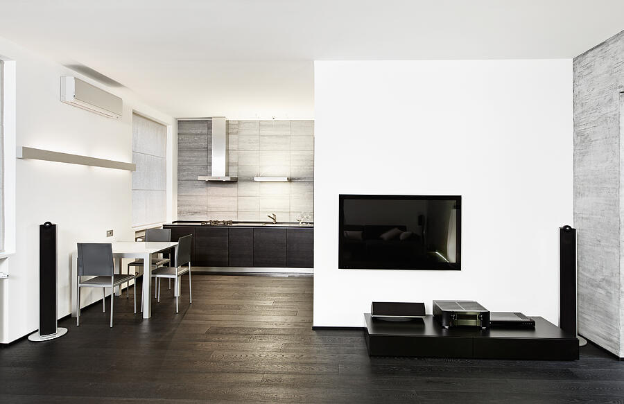 Modern minimalism style kitchen and drawing room interior in monochrome Photograph by Photo_HamsterMan
