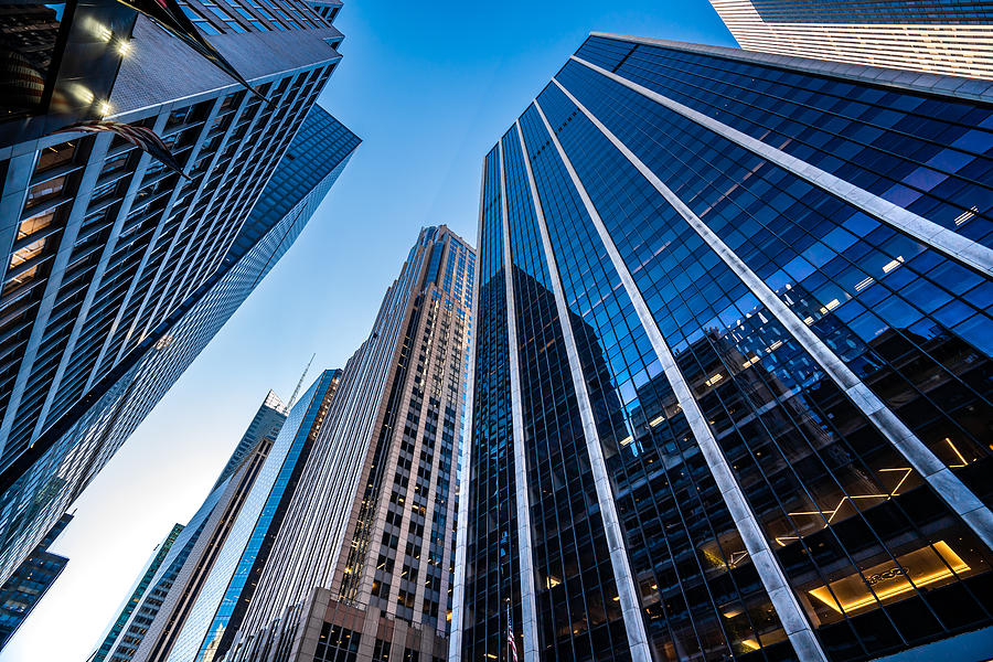 Modern skyscrapers in Midtown Manhattan Photograph by Yongyuan