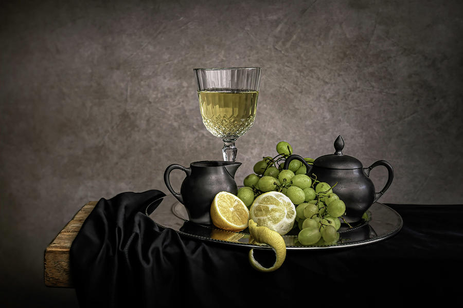 Modern still life white wine and grapes Photograph by Marjolein Van Middelkoop