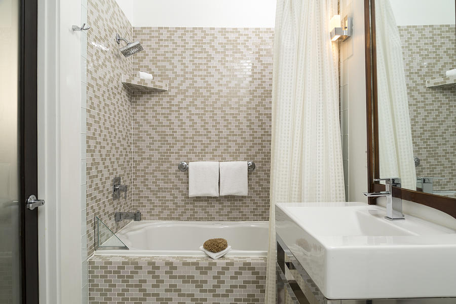 Modern Tiled Bathroom with Shower and Vanity Photograph by Jon Lovette