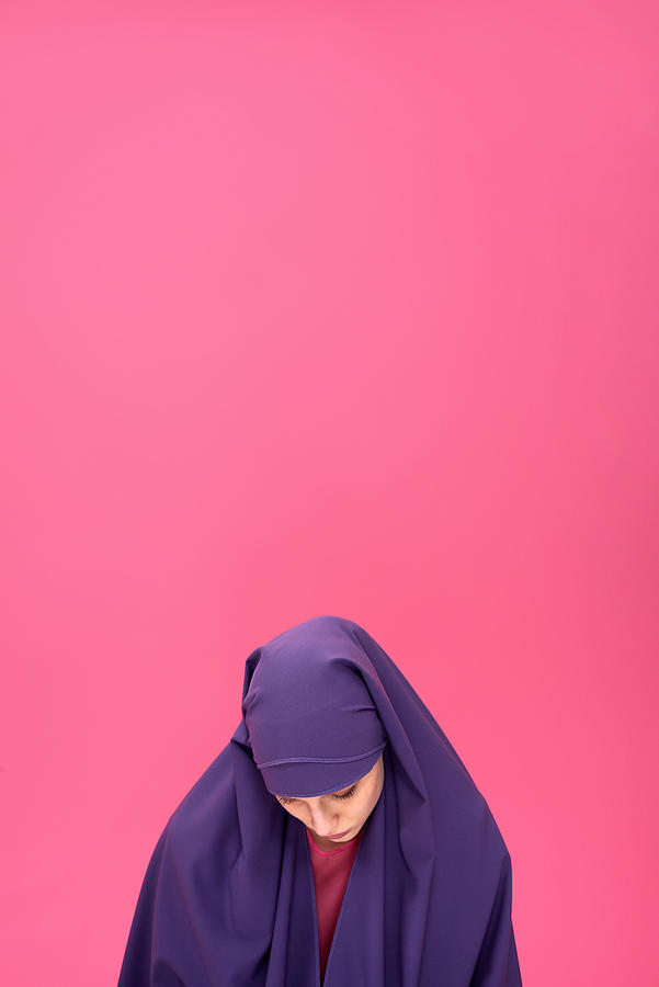 Modest woman in hijab Photograph by CliqueImages
