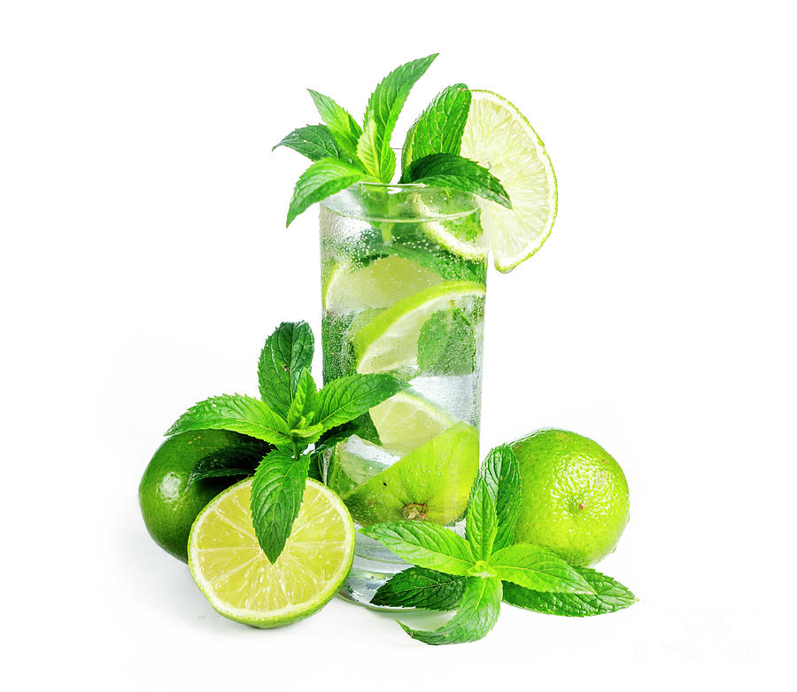 Mojito cocktail with ice isolated over white background. Photograph by Jelena Jovanovic