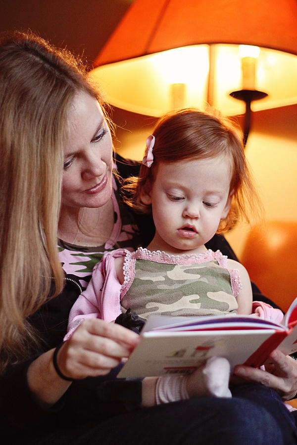 Mom Reading to Toddler Under Red Lamp Photograph by Leighanne Payne