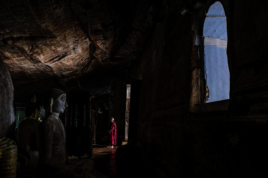 Monk at Dambulla Cave Temple Photograph by Arj Munoz