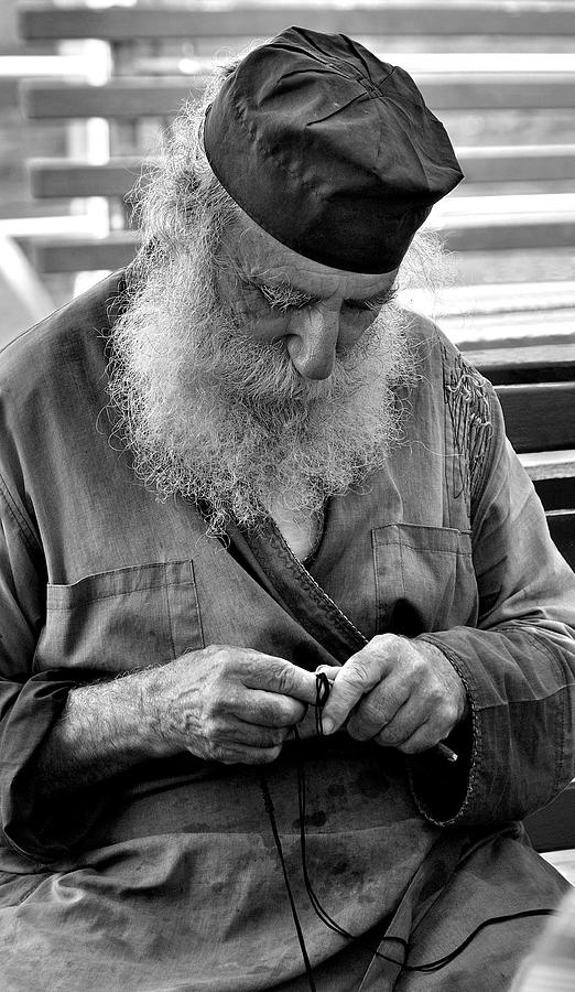 Monk knitting a prayer Photograph by Photo By Dimitrios Tilis