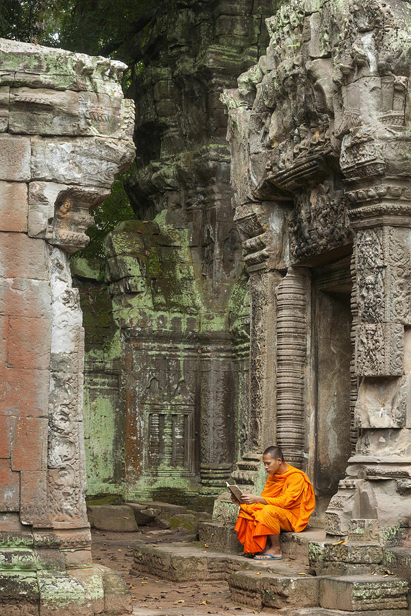 Monk reading at ruins Photograph by Wanderluster