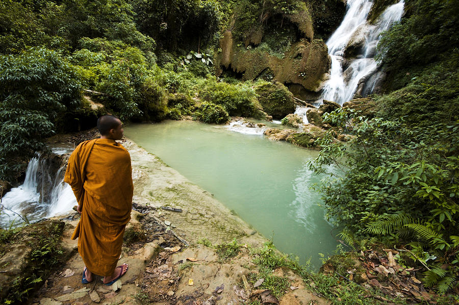 Monk Viewing Tat Kuang Si Waterfall in Laos Photograph by CWLawrence
