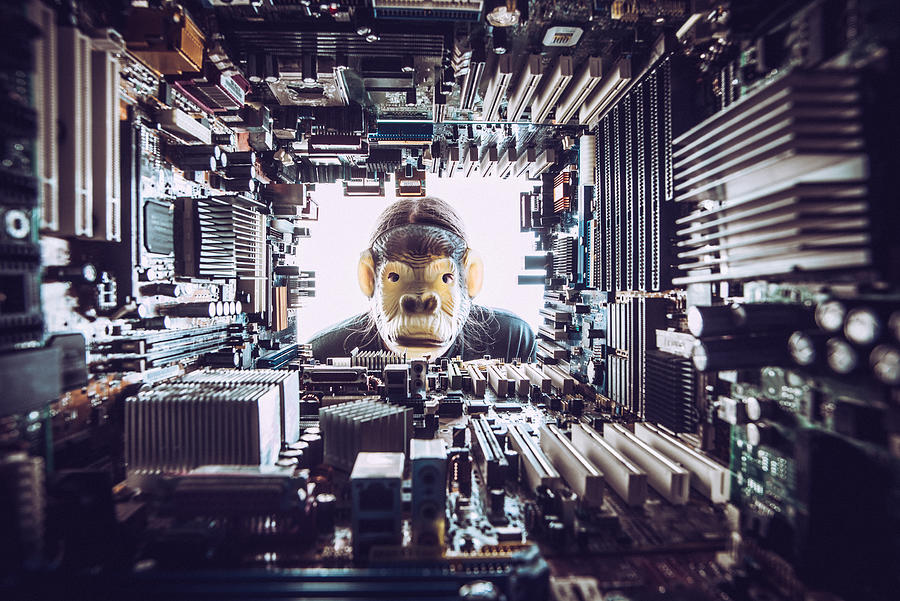 Monkey looking at Technology environment - concept Photograph by CasarsaGuru