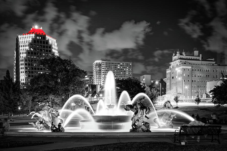 Monochrome Memorial Fountain Serenade With A Scarlet Solo - Kansas City Photograph by Gregory Ballos