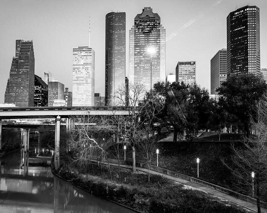 Monochrome Metropolis - Houstons Skyline Over The Buffalo Bayou Photograph by Gregory Ballos