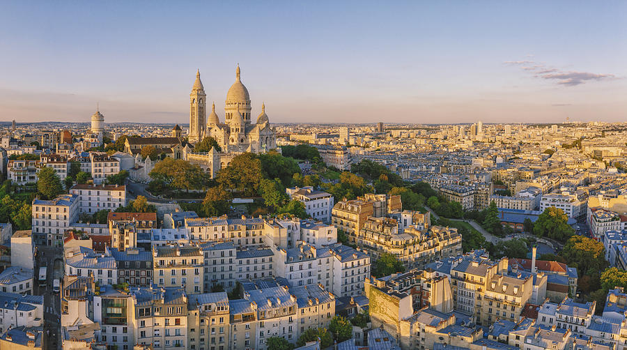 Montmartre hill with Basilique du Sacre-Coeur in Paris at sunset, aerial view Photograph by Pawel.gaul