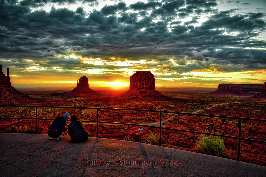 Sunset Photograph - Monument Valley A Coupling Enjoying The Sunrise On The Vista 02 Text by Thomas Woolworth